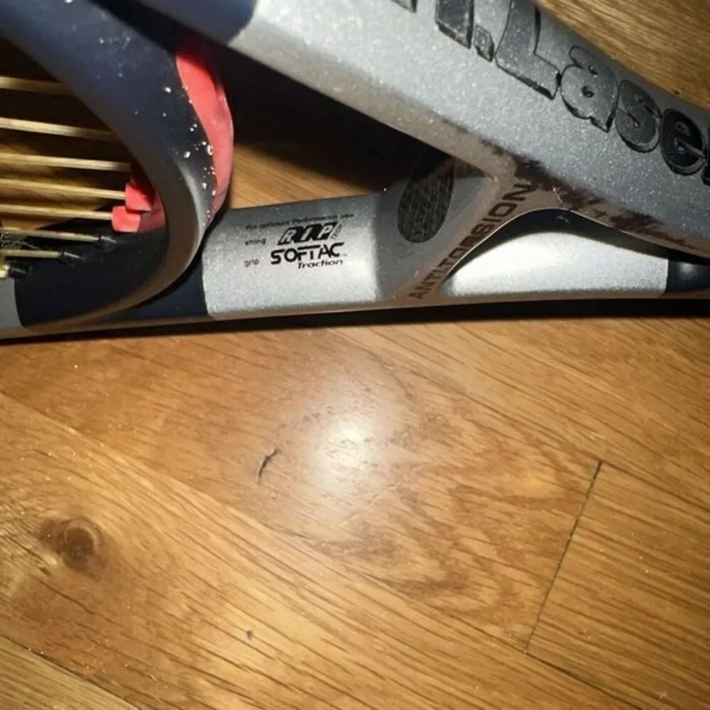HEAD Ti.Laser Xtra Long Mid Plus Tennis Racquet 4-3/8